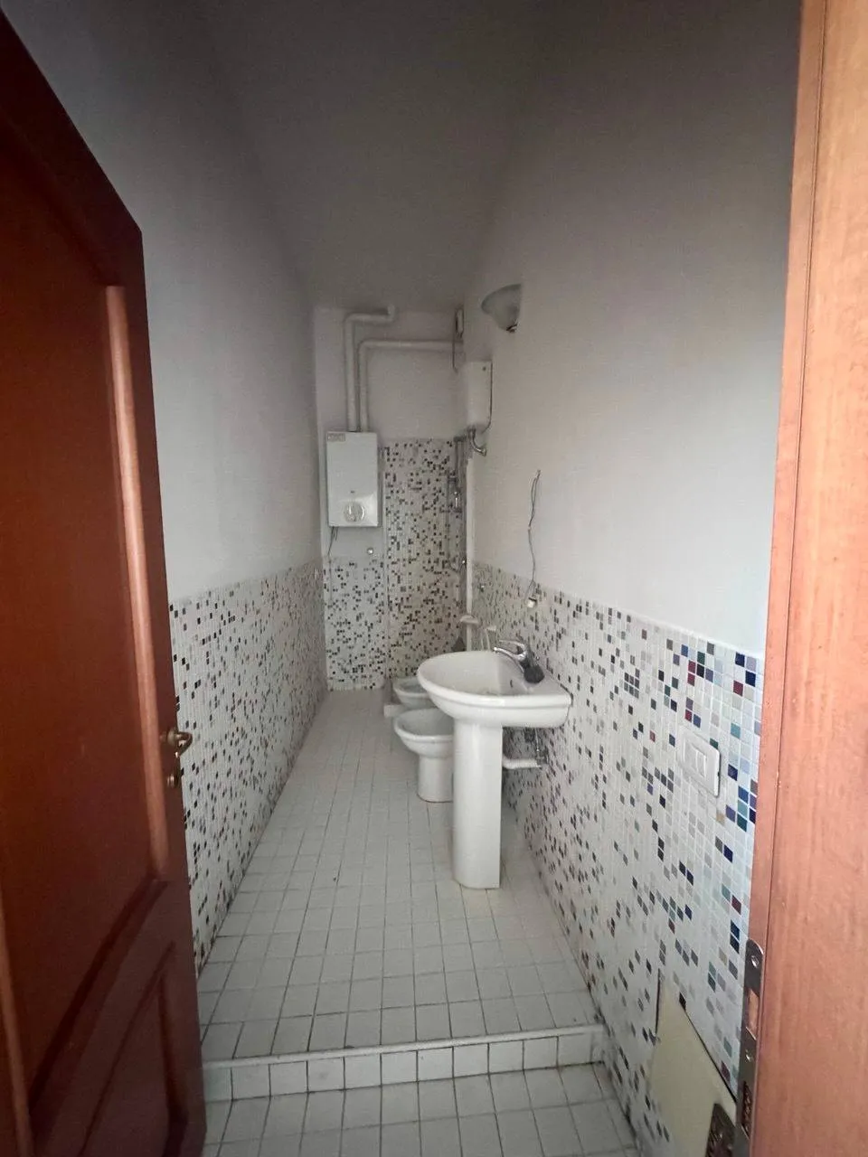 Vendesi Bilocale Ristrutturato Con Terrazzo e Garage – Rif. A320